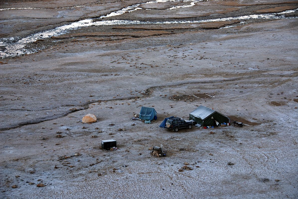 01 Shishapangma North Base Camp We arrive at Shishapangma North Chinese Base Camp and camp next to the local Chinese security tent. Base Camp is almost deserted since there is only one climbing team left up at ABC.